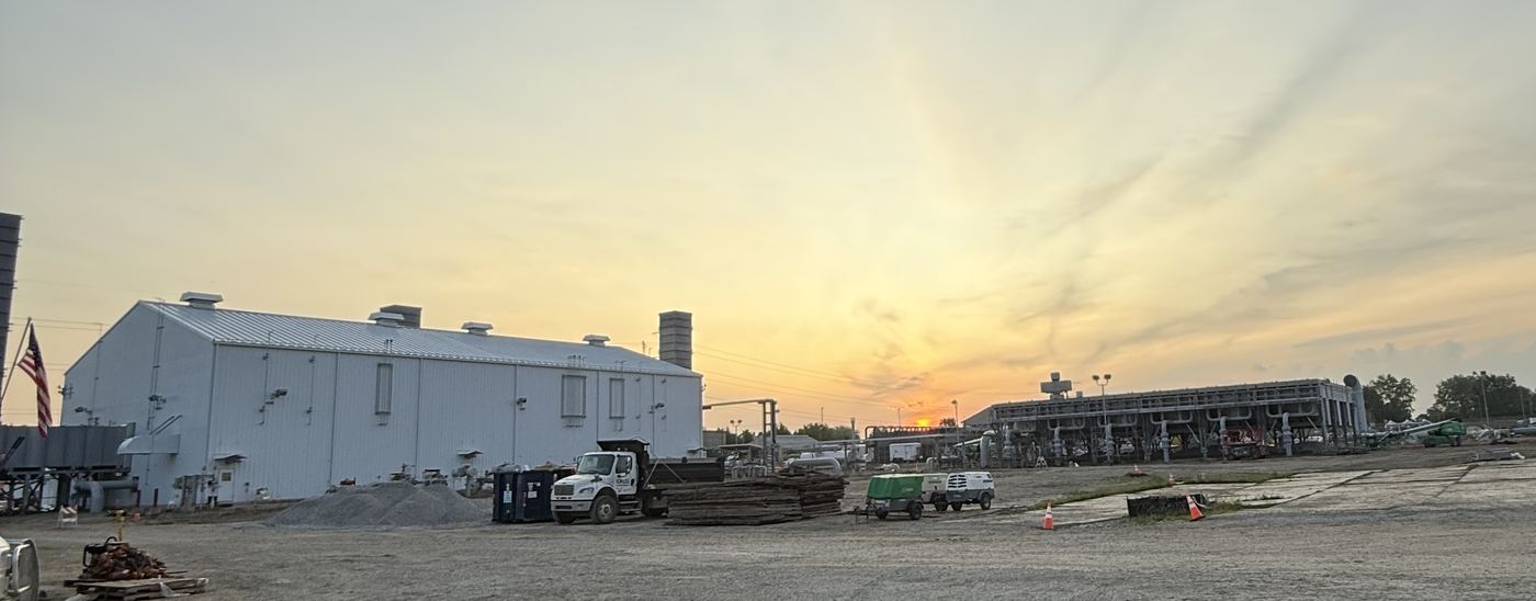 Compressor station at sunset